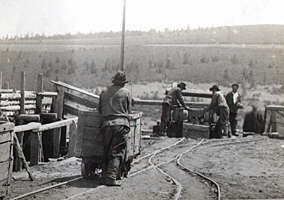 Filling up the mashinewith gold-bearing gravel